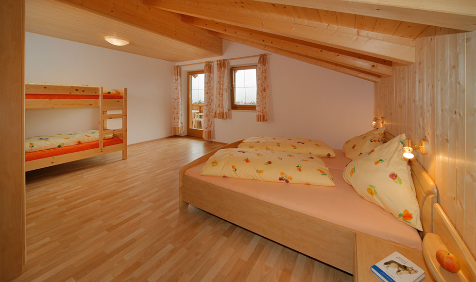 Ferienwohnung - Schlafzimmer mit Doppel- und Stockbett